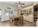 Kitchen boasts a breakfast nook and plenty of cabinet space at 12742 W Ash St, El Mirage, AZ 85335