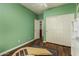 Light and airy bedroom with wood flooring and double doors at 13809 W Maui Ln, Surprise, AZ 85379