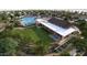 Expansive community lawn with a clubhouse and pool in the background at 16682 W Alameda Rd, Surprise, AZ 85387