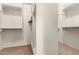 Large walk-in closet with ample shelving and hanging space at 25642 N Fernbush Dr, Phoenix, AZ 85083