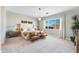 Spacious bedroom with neutral color palette and en-suite bathroom at 25921 N 76Th Ave, Peoria, AZ 85383