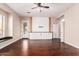 Main bedroom with built-in media console and hardwood floors at 31521 N 48Th St, Cave Creek, AZ 85331