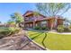 Two-story home with a balcony and stone accents at 31521 N 48Th St, Cave Creek, AZ 85331