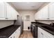 Laundry room with washer, dryer, and ample counter space at 31521 N 48Th St, Cave Creek, AZ 85331