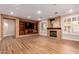 Bright living room featuring a fireplace and large windows at 31521 N 48Th St, Cave Creek, AZ 85331