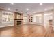 Spacious living room with a fireplace and built-in shelving at 31521 N 48Th St, Cave Creek, AZ 85331