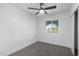 Bedroom with ceiling fan and window at 3817 W Grove St, Phoenix, AZ 85041