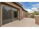 Balcony with sliding glass doors leading to interior at 398 W Lyle Ave, San Tan Valley, AZ 85140