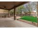 Covered patio overlooking the backyard at 398 W Lyle Ave, San Tan Valley, AZ 85140