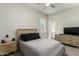 Guest bedroom with dresser, nightstand, and ceiling fan at 4506 S Eastern Run, Mesa, AZ 85212