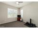 Home office or exercise room with window shutters and ceiling fan at 4506 S Eastern Run, Mesa, AZ 85212