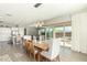 Light and airy dining room with sliding glass doors leading to the backyard at 4506 S Eastern Run, Mesa, AZ 85212