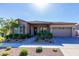 House exterior showcasing a welcoming front porch and landscaping at 4506 S Eastern Run, Mesa, AZ 85212