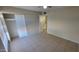 Bedroom with tile floors and view of the bathroom at 4901 W Cheery Lynn Rd, Phoenix, AZ 85031