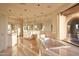 Spa-like bathroom with marble flooring, a large soaking tub, and stunning views at 6020 E Indian Bend Rd, Paradise Valley, AZ 85253