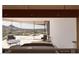 Bedroom with panoramic views and sitting area at 6020 E Indian Bend Rd, Paradise Valley, AZ 85253