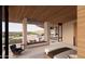 Bedroom with fireplace and city views at 6020 E Indian Bend Rd, Paradise Valley, AZ 85253