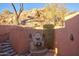 Charming courtyard with a tiled fountain and stucco walls at 6020 E Indian Bend Rd, Paradise Valley, AZ 85253