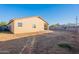 Large backyard with gravel and patio at 604 S 13Th Pl, Coolidge, AZ 85128