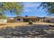 Backyard with patio and a wheelbarrow at 710 N Poplar St, Gilbert, AZ 85233