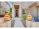 Welcoming front entry with walkway and decorative planters at 7617 E Sands Dr, Scottsdale, AZ 85255