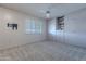 Bedroom with wood flooring, large closet, and ceiling fan at 10610 W Saratoga Cir, Sun City, AZ 85351
