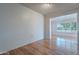 Empty bonus room with wood floors and an open layout at 10610 W Saratoga Cir, Sun City, AZ 85351