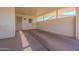 Covered carport with ample space for parking and storage at 10610 W Saratoga Cir, Sun City, AZ 85351
