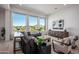 Bright living room with hardwood floors, large windows, and mountain views at 10621 N Mountain Vista Ct, Fountain Hills, AZ 85268