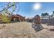 Large backyard with grassy area, playset and view of home at 10638 N 15Th Ln, Phoenix, AZ 85029