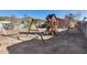 Large backyard with grassy area and playset at 10638 N 15Th Ln, Phoenix, AZ 85029