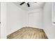 Bedroom with tile floors, double closet doors, and ceiling fan at 1757 W Sunland Ave, Phoenix, AZ 85041