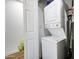 Stackable washer and dryer in dedicated laundry room at 1757 W Sunland Ave, Phoenix, AZ 85041