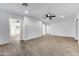 Living area with tile floors and access to other rooms at 1757 W Sunland Ave, Phoenix, AZ 85041