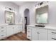 Elegant bathroom with double sinks, large mirrors, and modern fixtures at 1935 W El Cortez Trl, Phoenix, AZ 85085