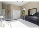 Serene bedroom with king-size bed and sliding door closet at 20834 W Western Dr, Buckeye, AZ 85396