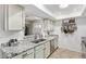 Modern kitchen with granite countertops and ample cabinet space at 21002 N Totem Dr, Sun City West, AZ 85375