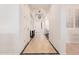 Bright hallway with tile flooring and neutral wall colors at 4040 E Jude Ln, Gilbert, AZ 85298