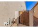 Wooden gate and gas meter in side yard at 4040 E Jude Ln, Gilbert, AZ 85298