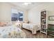 bedroom with two twin beds and built-in shelving at 4235 W Palace Station Rd, New River, AZ 85087