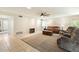 Relaxing living room with fireplace and comfortable seating at 5145 W Fallen Leaf Ln, Glendale, AZ 85310