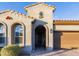 Covered entryway with arched doorway and tile flooring at 6916 E Quince St, Mesa, AZ 85207