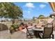 Wonderful backyard patio with fire pit, grill, and golf course view at 15240 N Clubgate Dr # 147, Scottsdale, AZ 85254