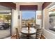 Breakfast nook with view of backyard and golf course at 15240 N Clubgate Dr # 147, Scottsdale, AZ 85254