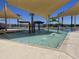 splash pad with colorful water features at 16068 W Questa Dr, Surprise, AZ 85387
