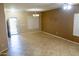 Bright living room featuring tile floors and neutral walls at 1807 S 234Th Ln, Buckeye, AZ 85326