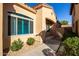 Front entry with walkway, landscaping, and blue shutters at 1972 W Olive Way, Chandler, AZ 85248