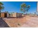 Backyard with shed and unfinished structure at 201 E 9Th St, Casa Grande, AZ 85122