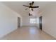 Bright and airy living room with ceiling fans at 201 E 9Th St, Casa Grande, AZ 85122