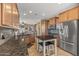 Kitchen with stainless steel appliances and granite counters at 22958 W Devin Dr, Buckeye, AZ 85326